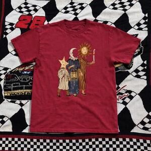 Red And Yellow Graphic Tee With A Unique Design